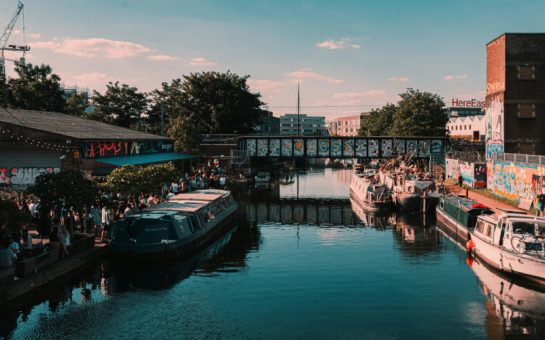 Hackney Wick, displaying the river, bridge, and houseboats