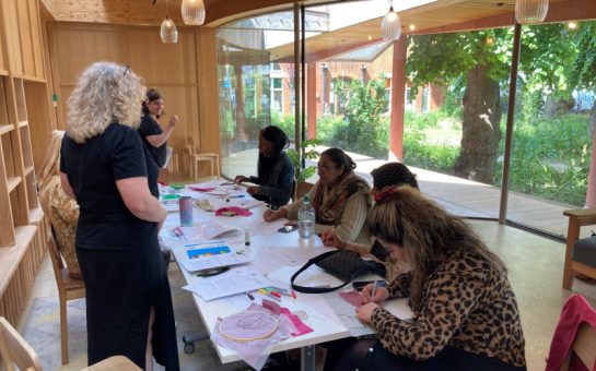 Group of women at the Invisible Visible project art workshop on menopause