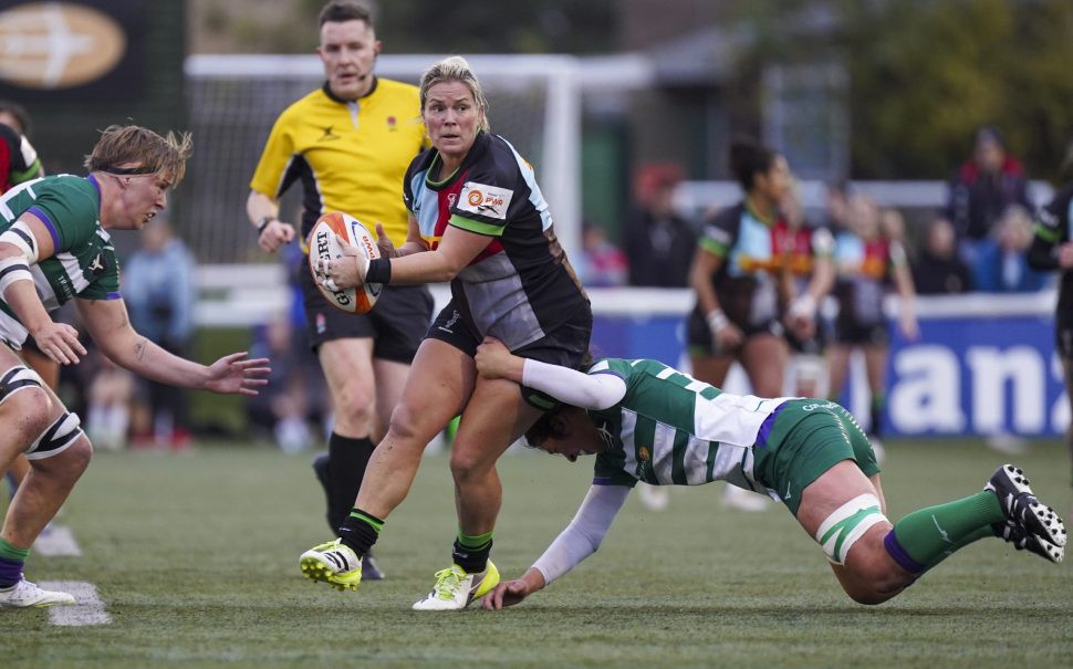 Burford (centre) in action against Ealing Trailfinders