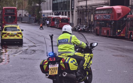 Police officer driving motorbike