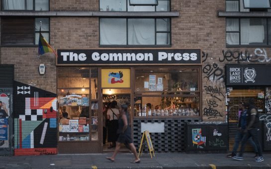 photo of street facing entrance to store saying the common press