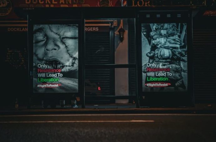 Pro Palestinian bus stop ads calling spotted throughout Tower Hamlets