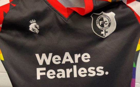 Hackney Women's black football kit with rainbow trim, which says 'We Are Fearless' written across the middle.